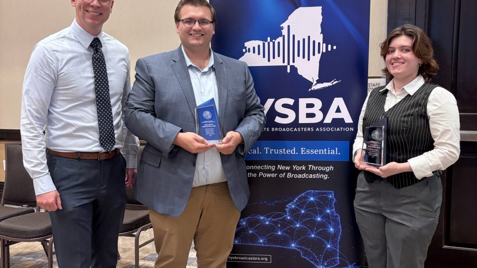 From left, Communication Studies Chair Michael Riecke congratulates award-winning Lakers Dominick Ciccarelli and Ray Katz