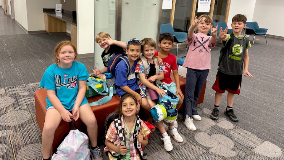 Young students in the 2026 edition of Sheldon Institute gather and pose for a photo.