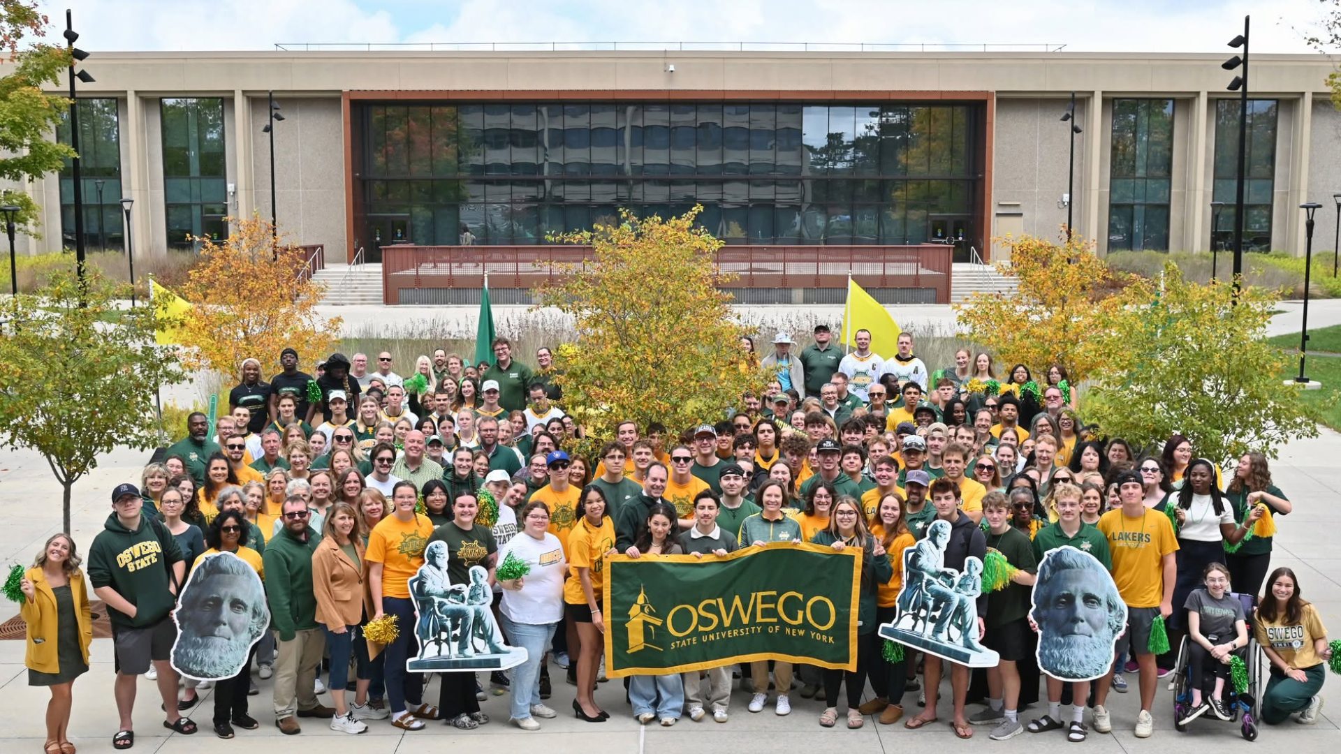 Many Lakers wearing green and gold
