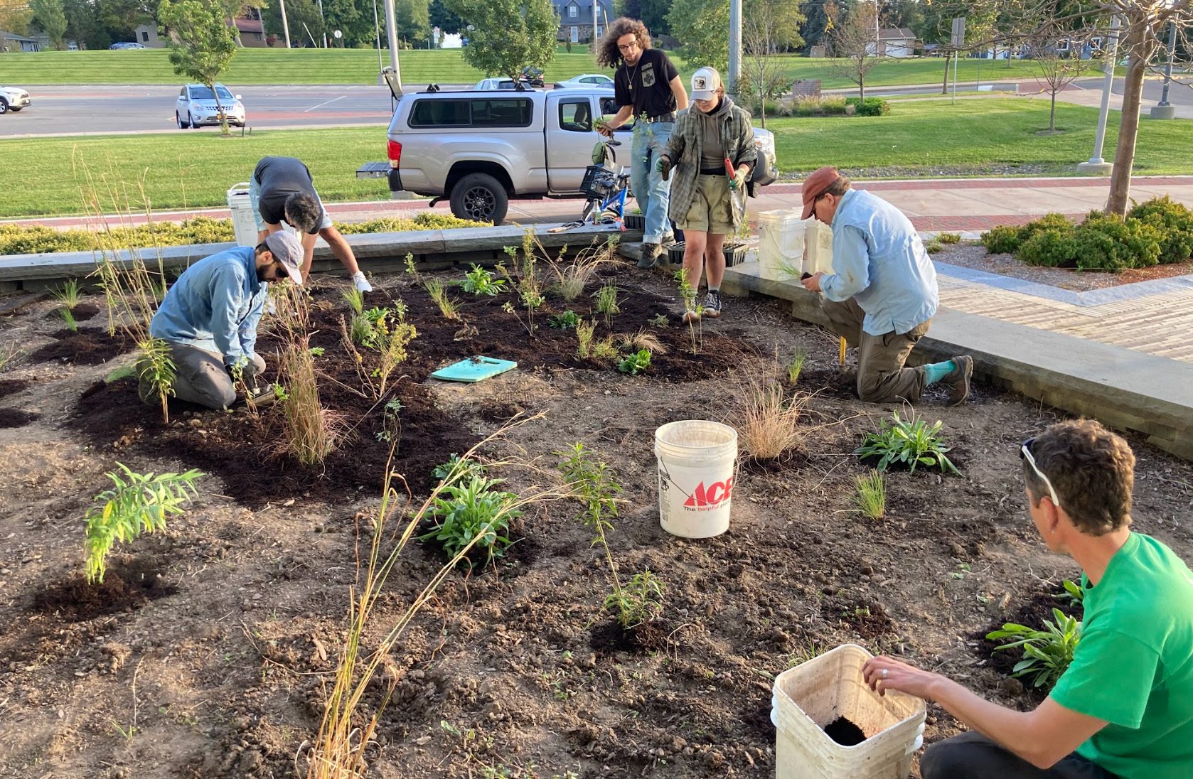 Students, faculty, staff and volunteers maintain the alvar garden on campus, one of many initiatives dovetailing with SUNY Oswego's recent Bee Campus USA designation