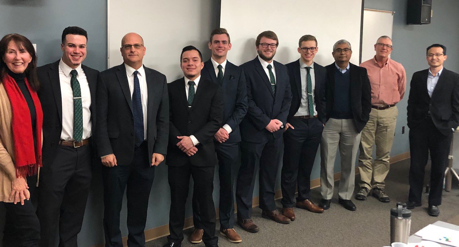 Winning CFA competition student team with supporters