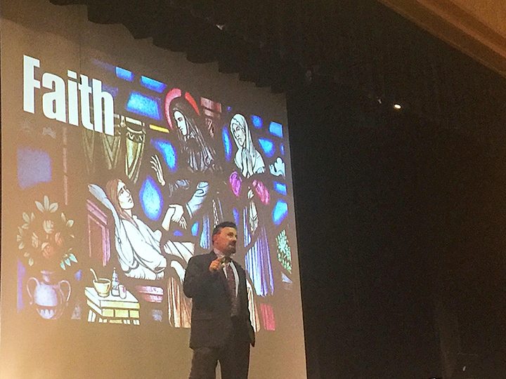Frank DeAngelis, Columbine's former principal, speaks at national briefing; a slide behind him reads: faith