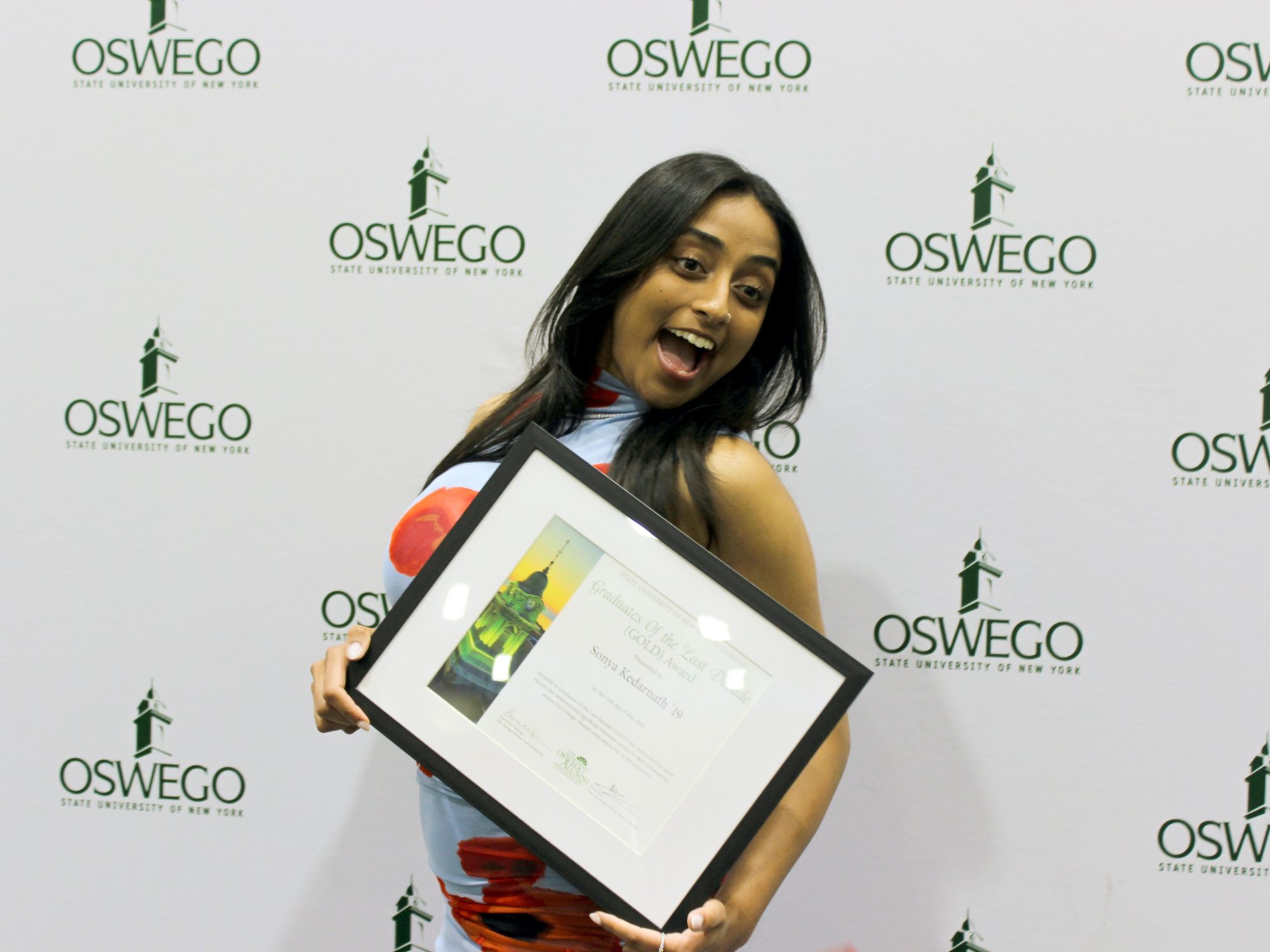 SUNY Oswego launched its 2026 alumni recognition season by honoring 2019 graduate Sonya Kedarnath with the Graduates Of the Last Decade (GOLD) Award during the Commencement Eve Reception
