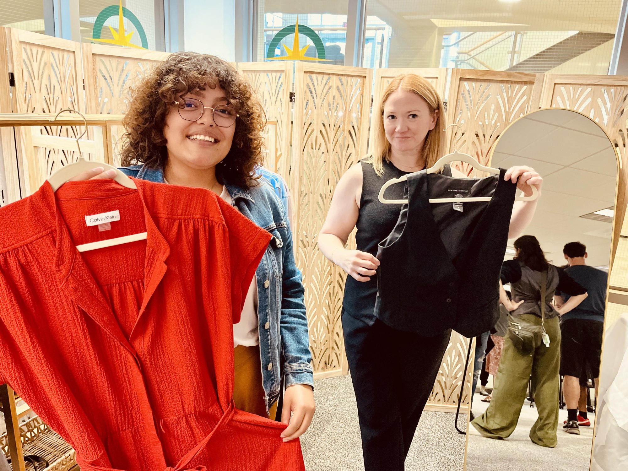 From left, April Lopez from (SHOP) Students Helping Oz Peers and Megan Mazzoccone from Career Services are collaborating on establishing a pop-up boutique to provide students with free professional clothing.