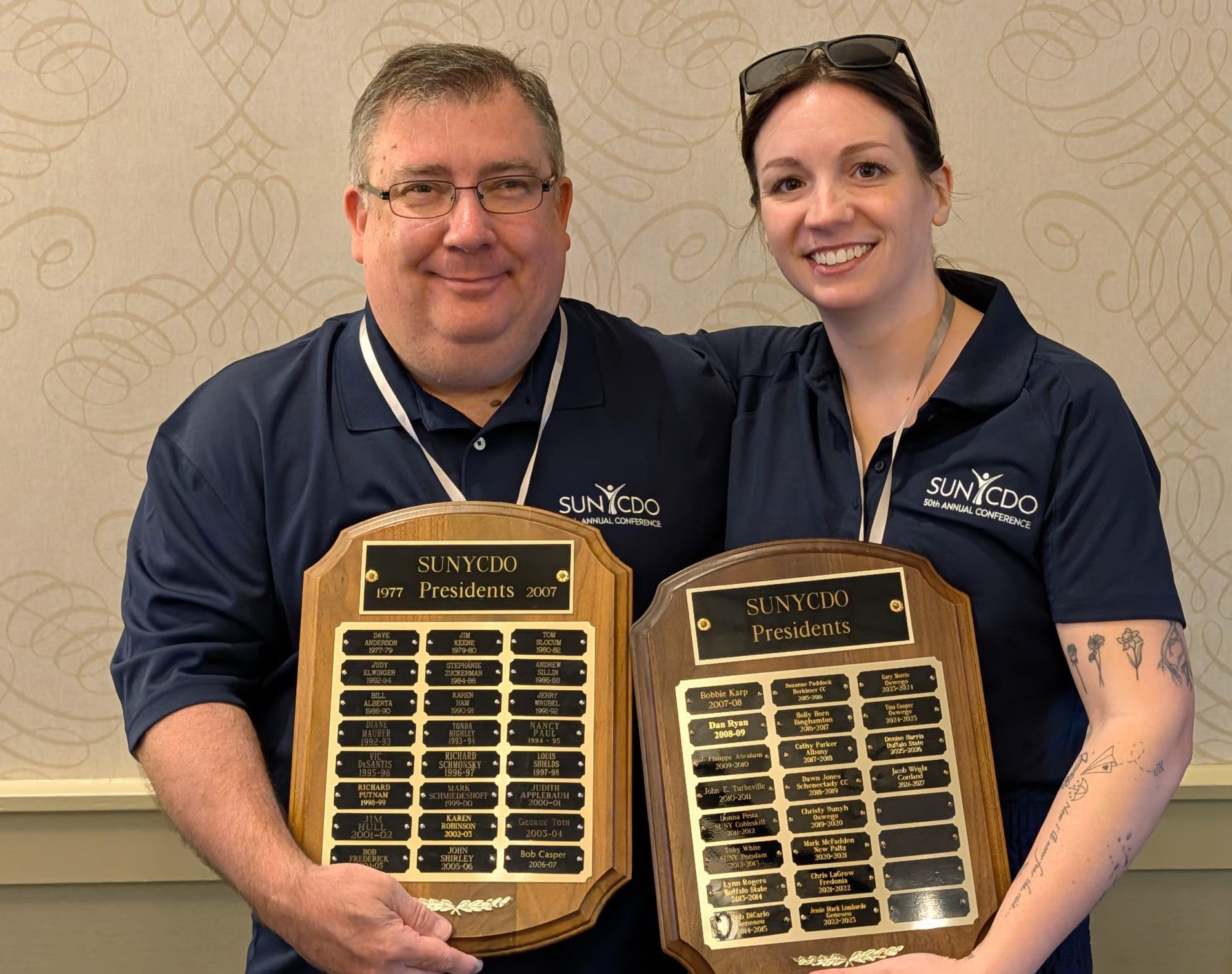SUNY Oswego's Tina Phillips, left, and Chris Grow from Fredonia were past presidents of the SUNY Career Development Organizations and co-chairs of its 50th-anniversary event in early June 2026