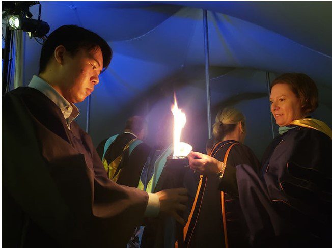Symbolic passing of the Torch of Knowledge for Torchlight