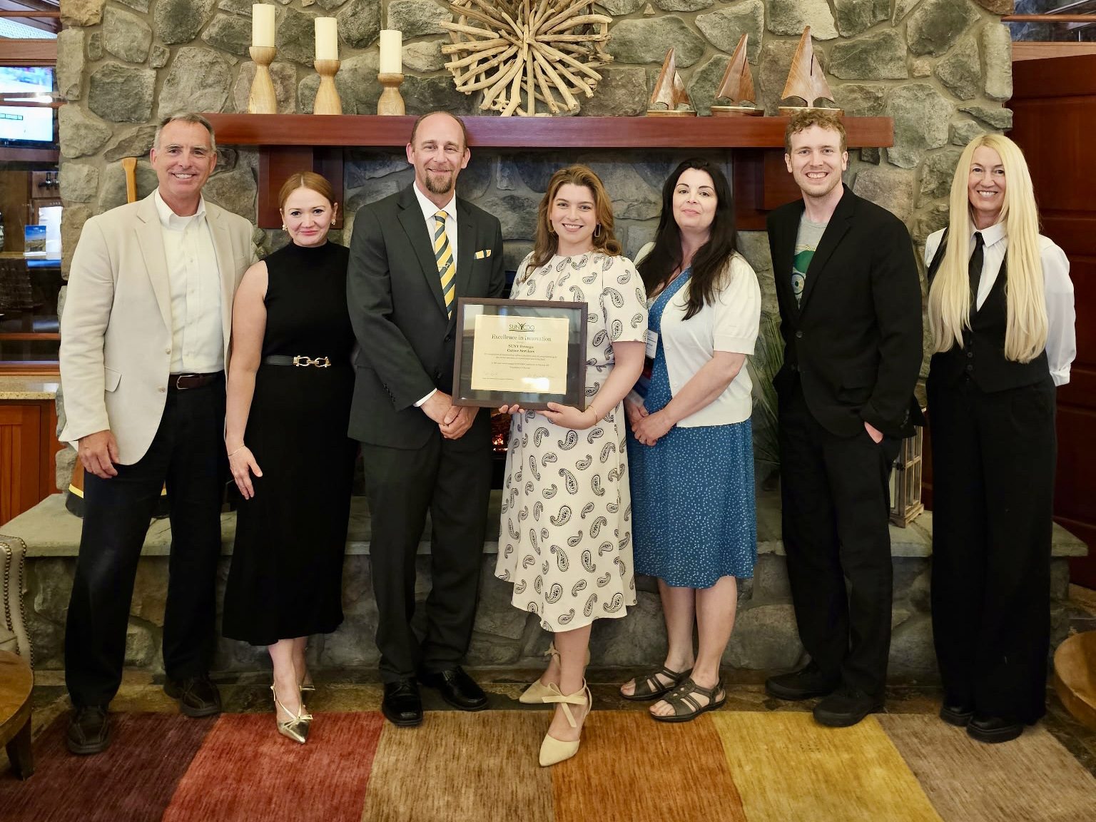 Career Services staff members celebrate award