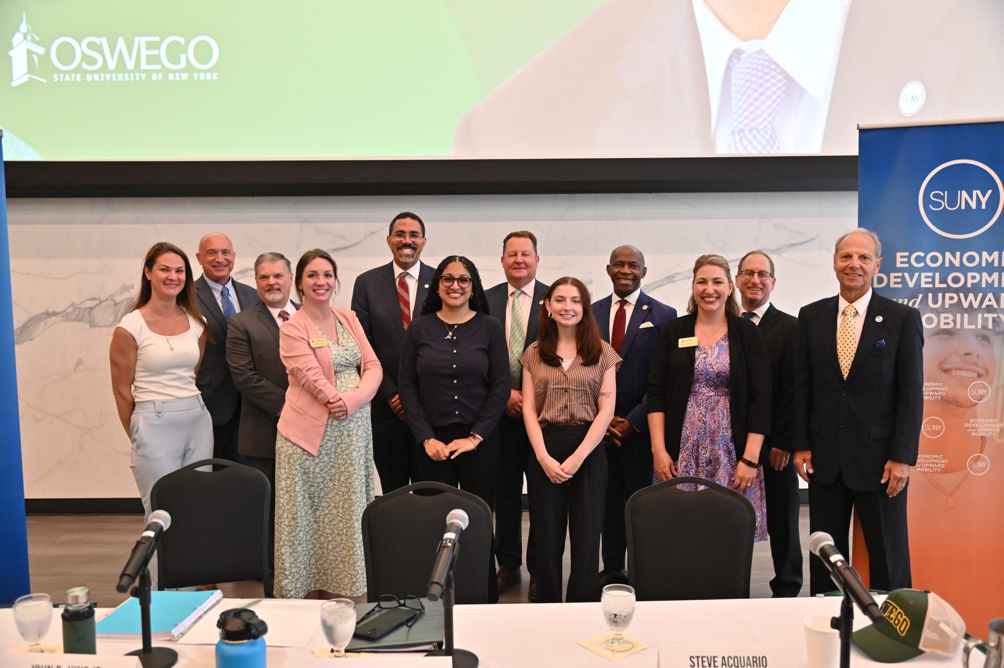 A group of SUNY Oswego students and leaders pose together following an event with SUNY Chancellor John B. King Jr.