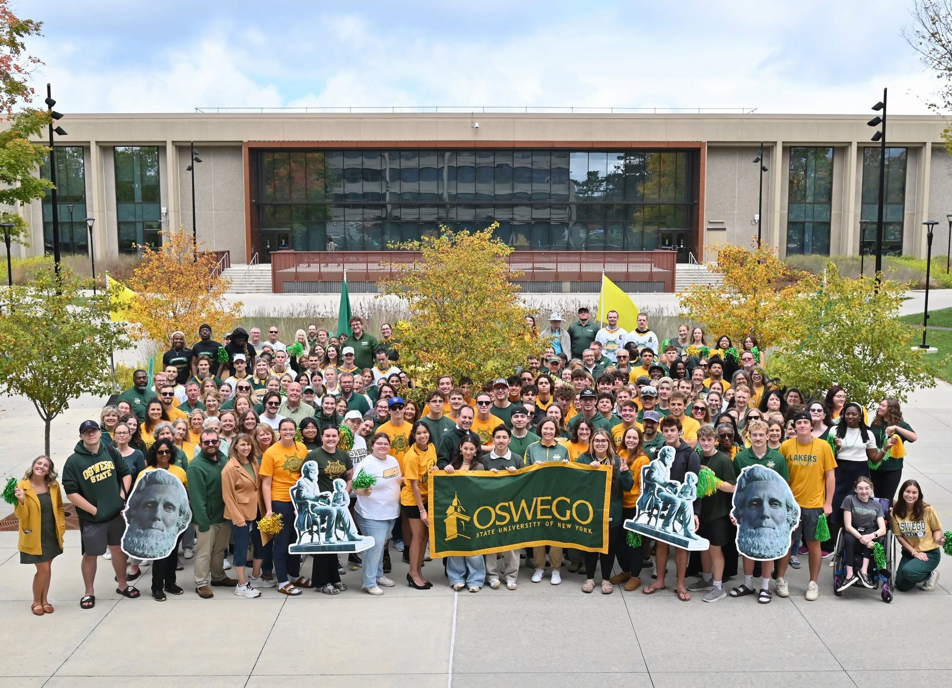 Many Lakers wearing green and gold