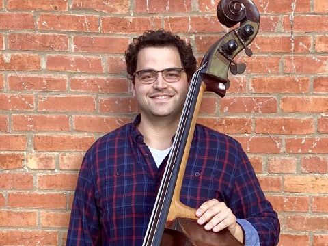 Mario Pietra holds a standup bass