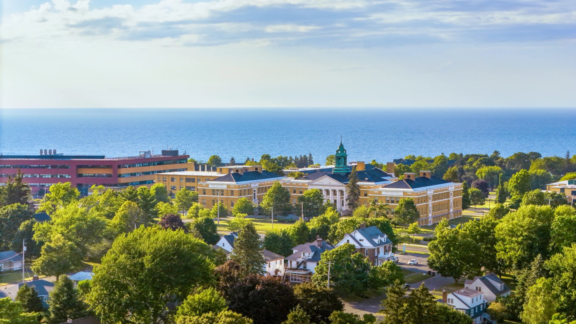 Aerial overview of scenic lakeside SUNY Oswego campus