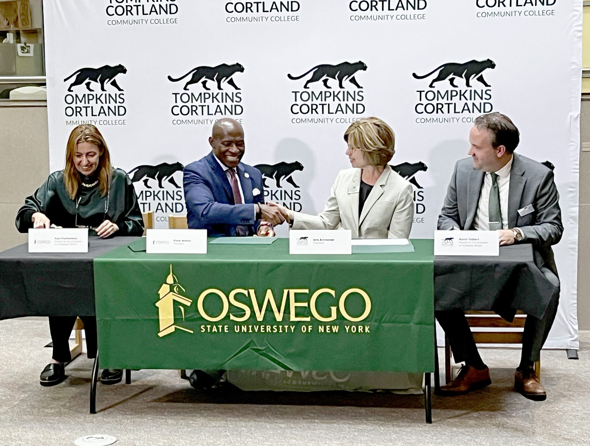Signing new agreements to enhance student transfer opportunities from Tompkins Cortland Community College (TC3) to SUNY Oswego are, from left, SUNY Oswego Provost Kate Pechenkina, SUNY Oswego President Peter O. Nwosu, TC3 President Amy Kremenek and TC3 Provost Aaron Tolbert. The ceremony took place Sept. 9 on TC3's Dryden campus.