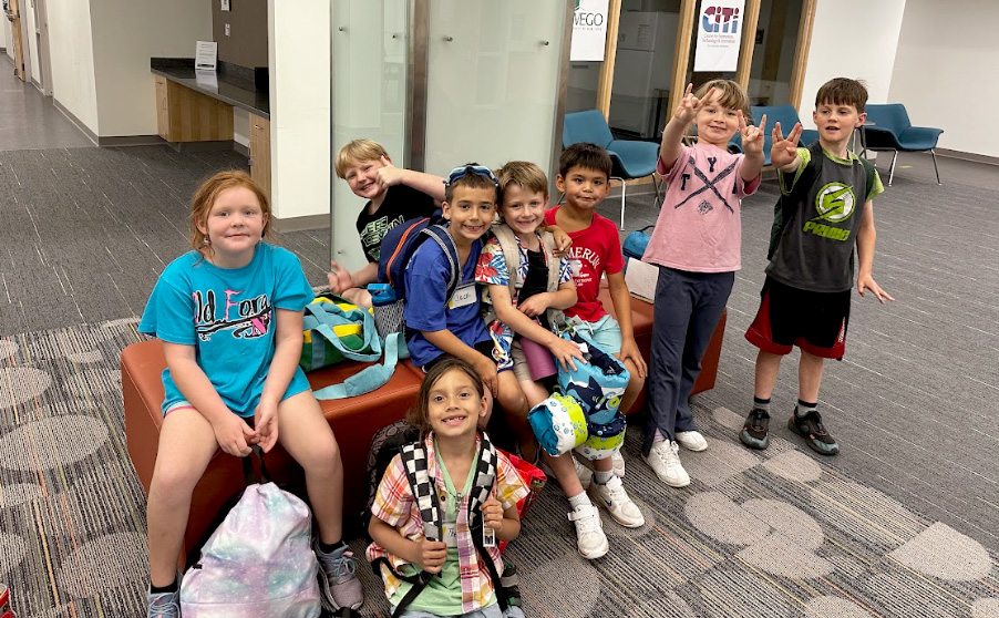 Young students in the 2026 edition of Sheldon Institute gather and pose for a photo.
