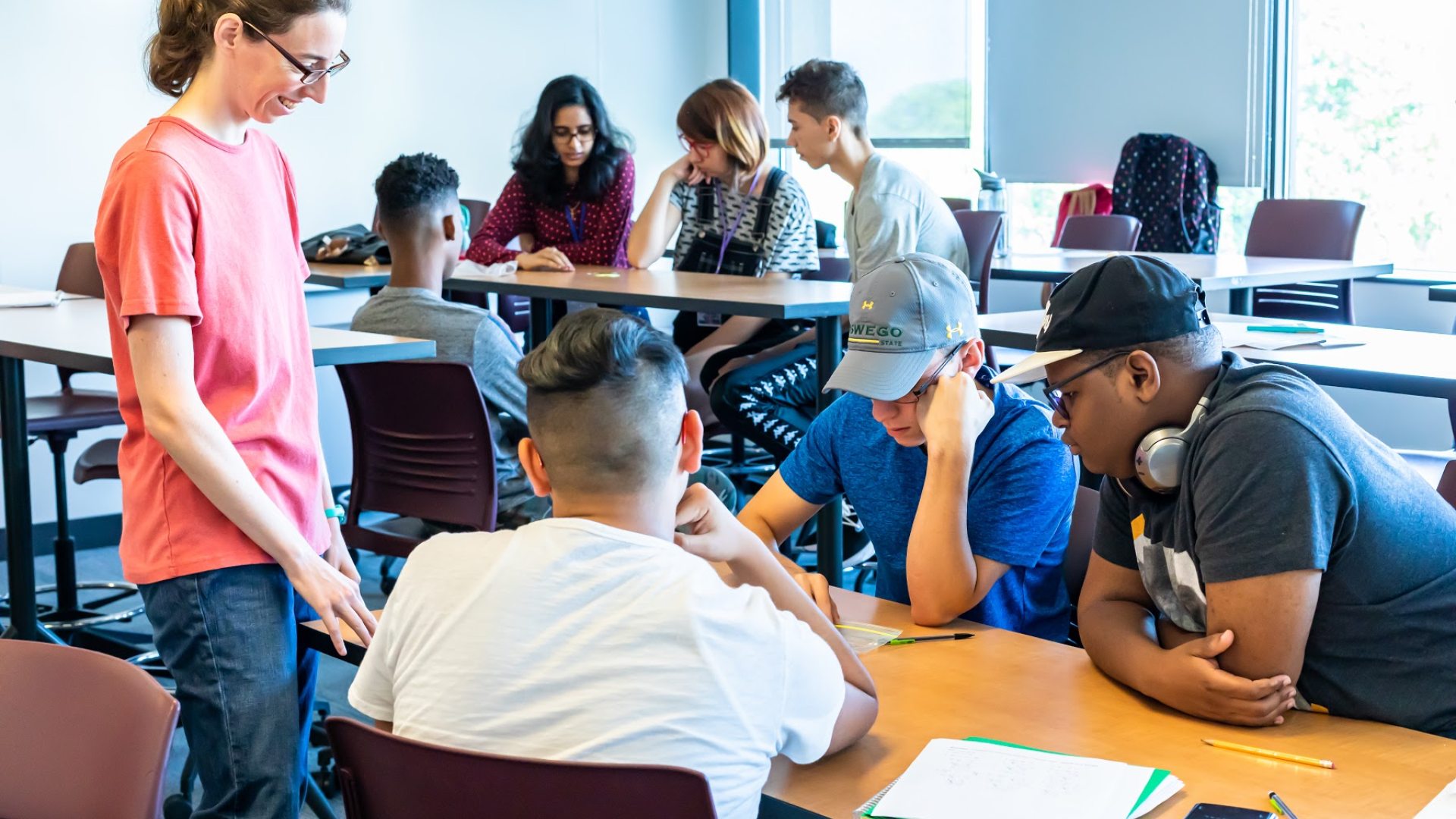 Students and faculty work together to solve challenging math problems. 