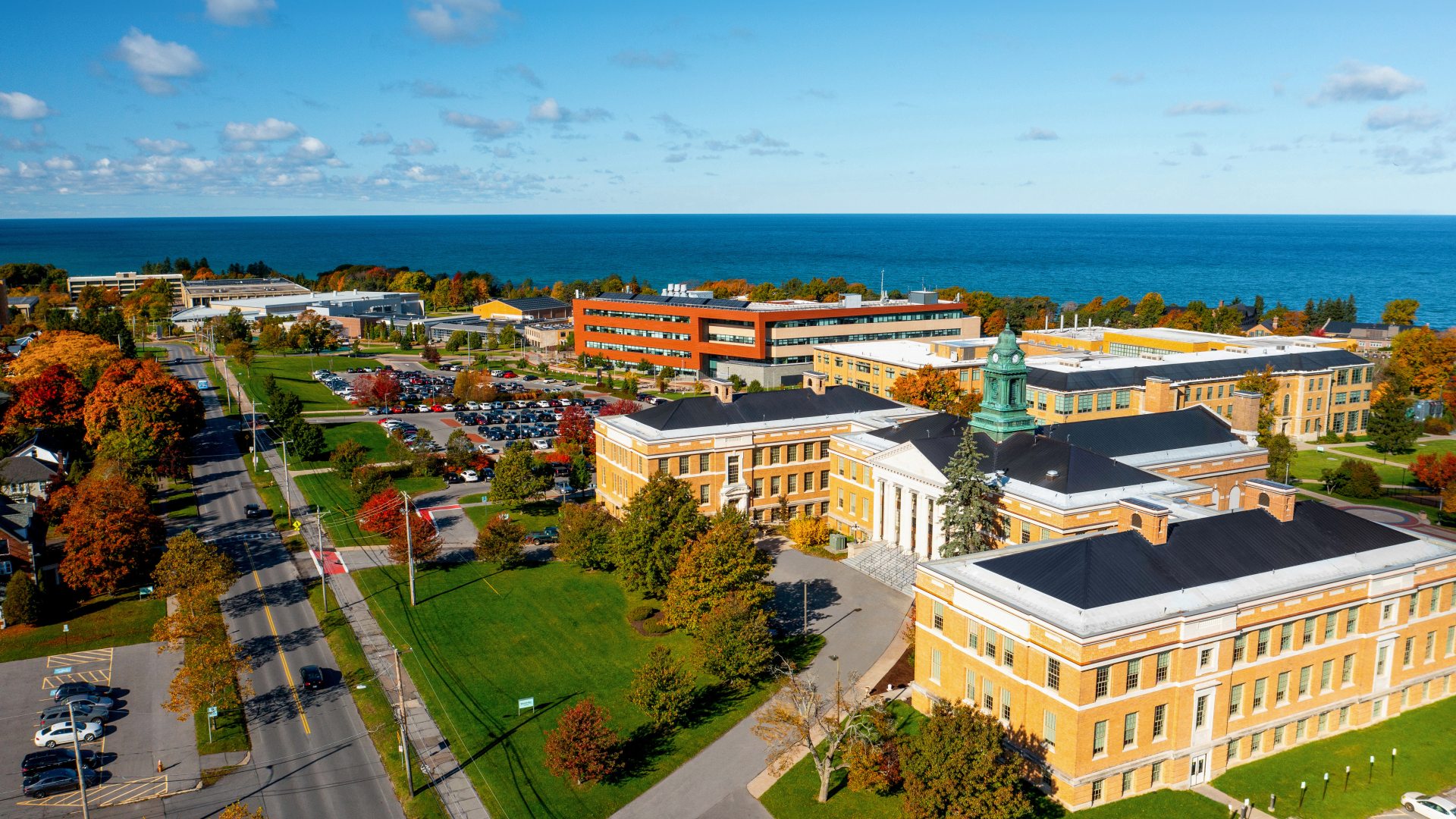 aerial view of Sheldon and Shineman Halls with the lake in the background