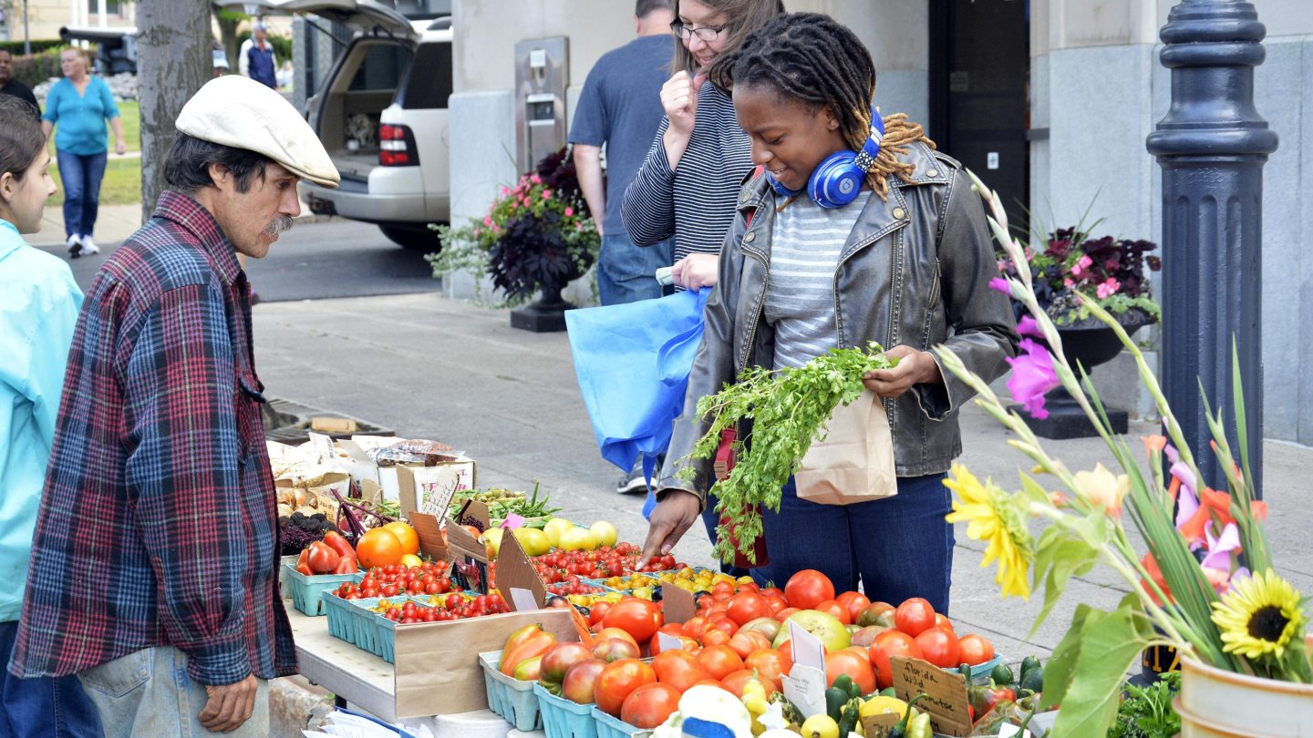 A table of produce at the Oswego Farmer&#039;s Market