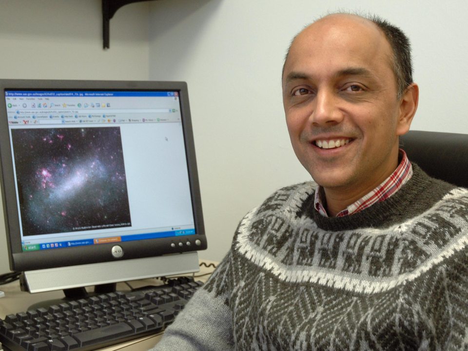 Professor Kanpur by his computer