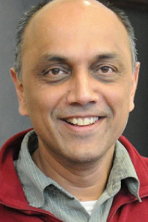 headshot of Shashi Kanbur