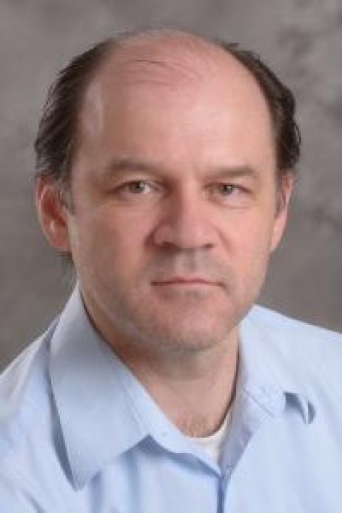 headshot of Ildar Sabirianov