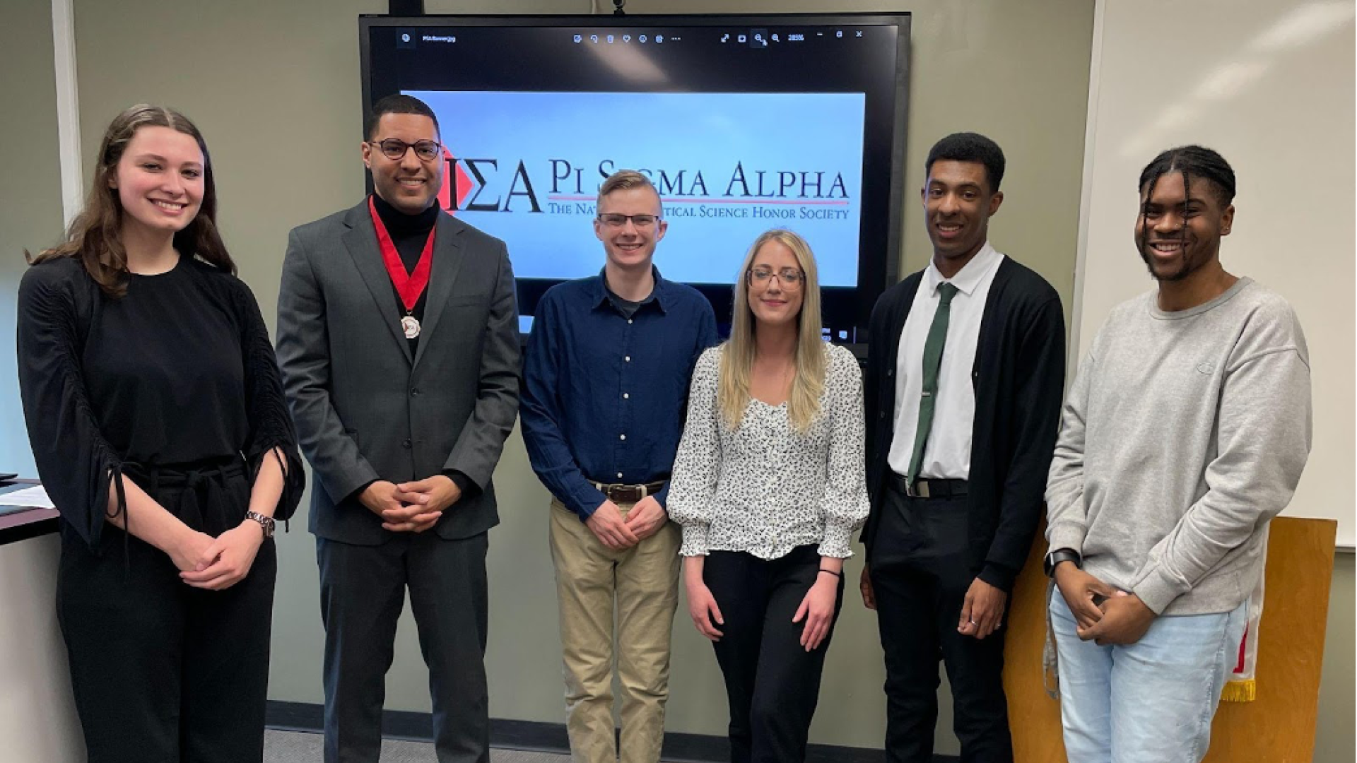 Pi Sigma Alpha Induction Ceremony 2023, with students and honored guest speaker Stefen Short '10