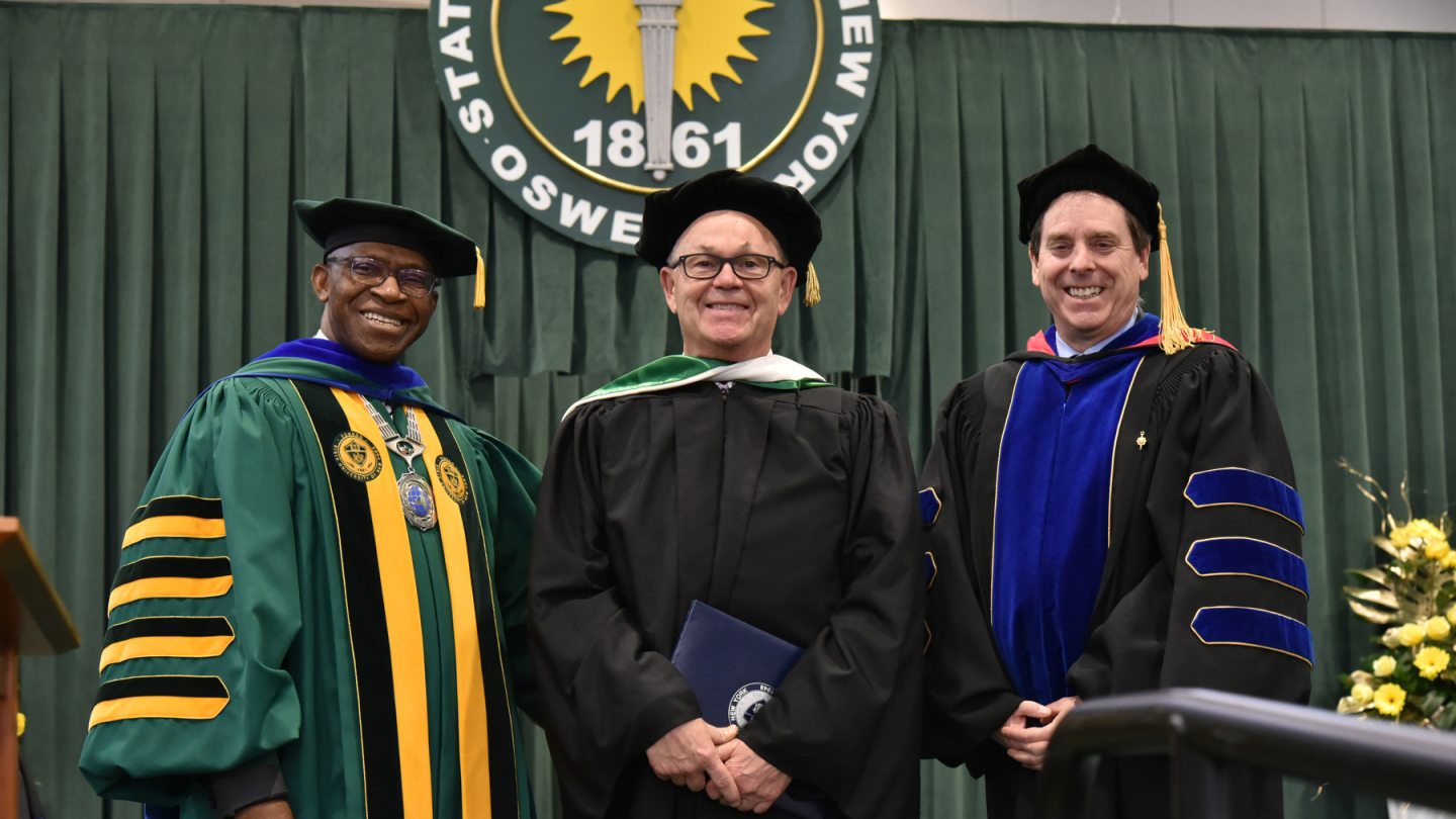 President Nwosu (left) with Peter Bocko (center) and Scott Furlong (right)