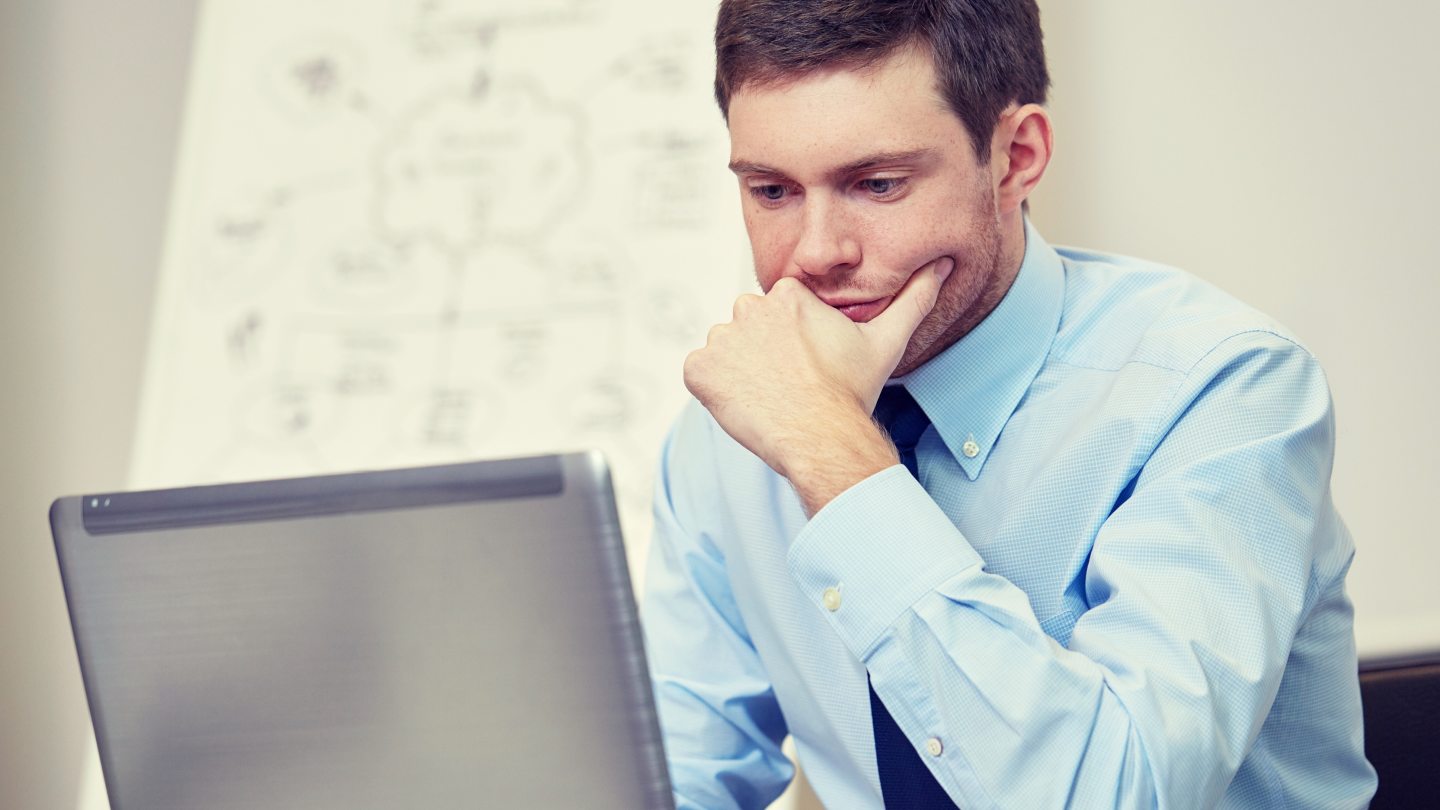 Online student male on computer