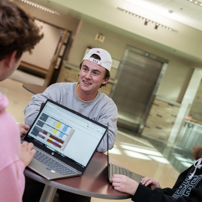 students working on a computer