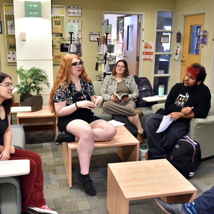 Creative writing students workshop new pieces in class