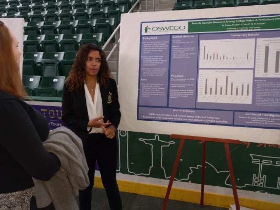 student giving presentation to an audience