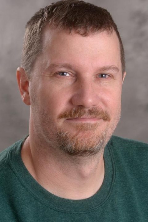 headshot of Paul Stewart