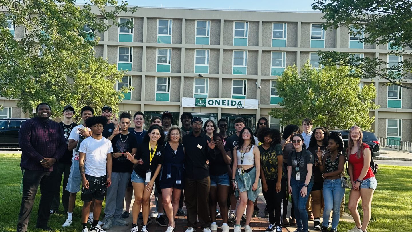 Group of students in front of Oneida Hall. 
