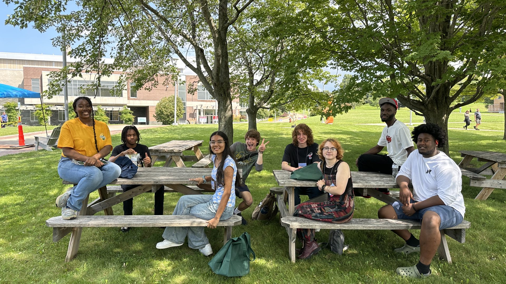 Students sitting on benches. 