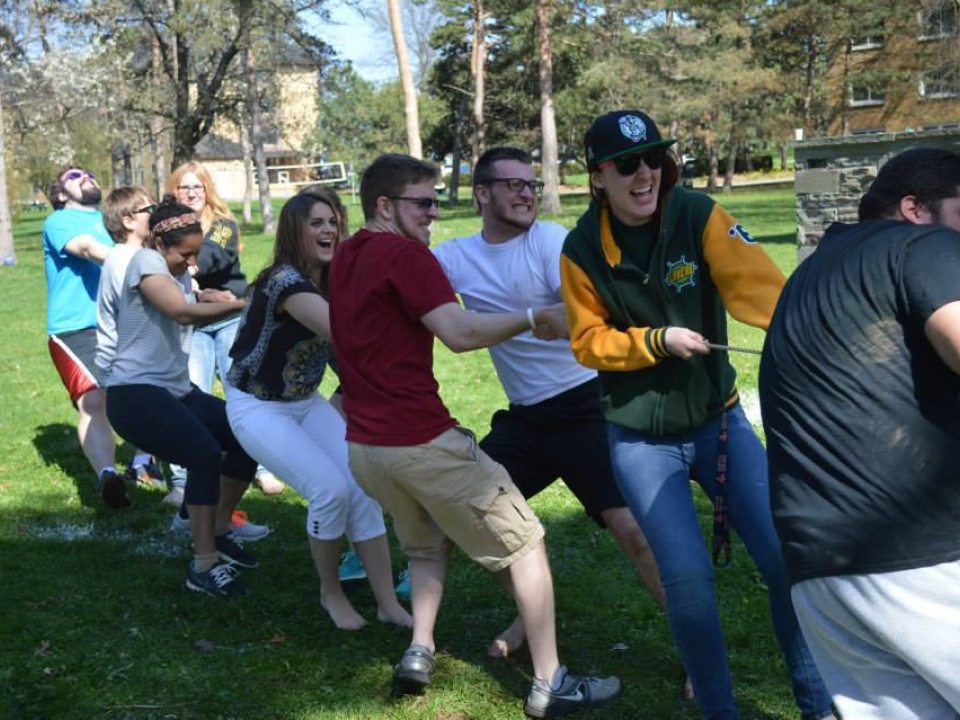 Students involved in a tug-of-war game