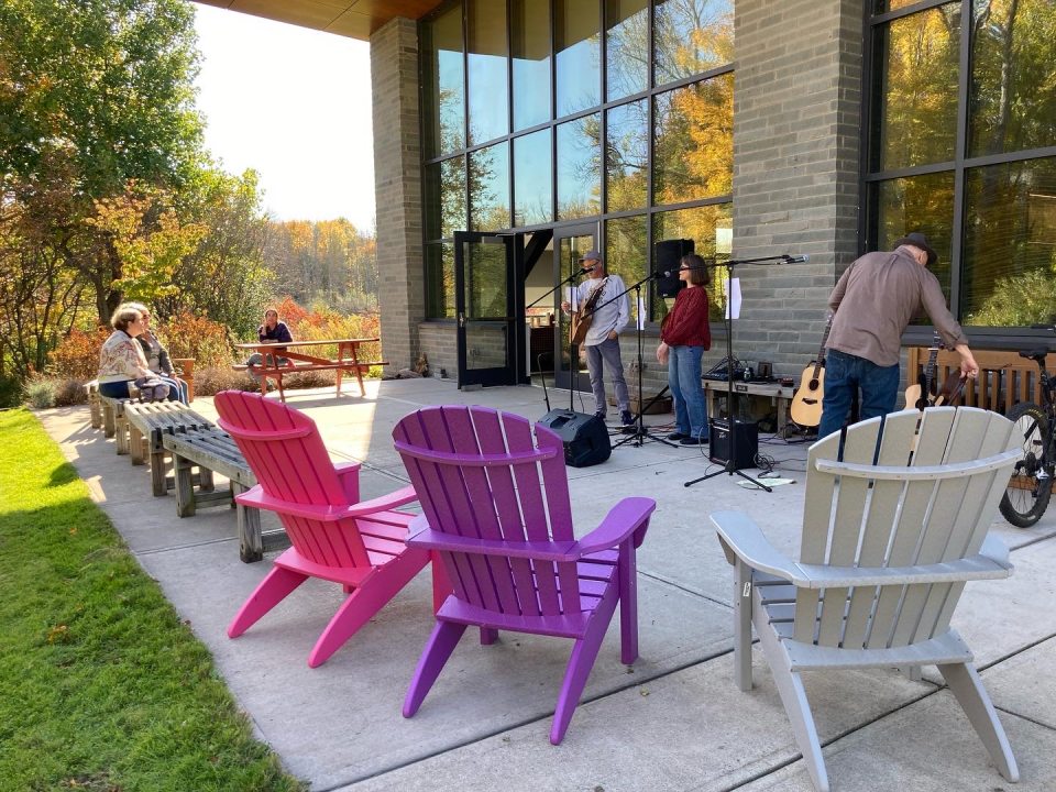 Outdoor concert with colorful yard chairs