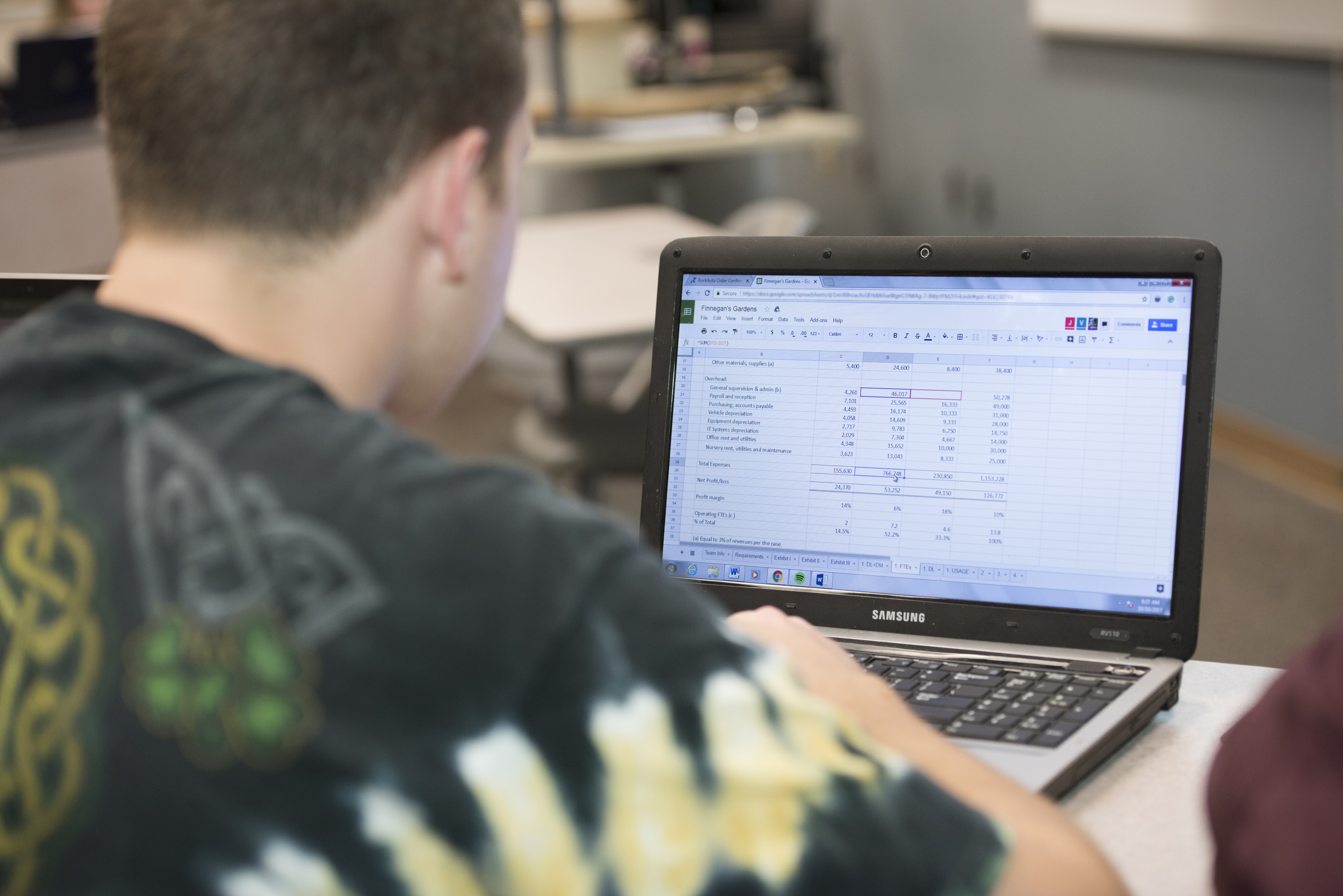 male student working on a computer