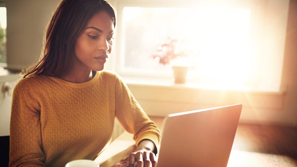 A woman at a laptop