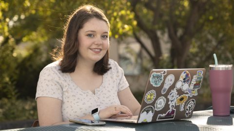 Student Outside on Laptop