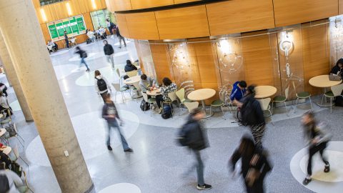 Students hustle to class in a blur through Shineman Center’s Nucleus.