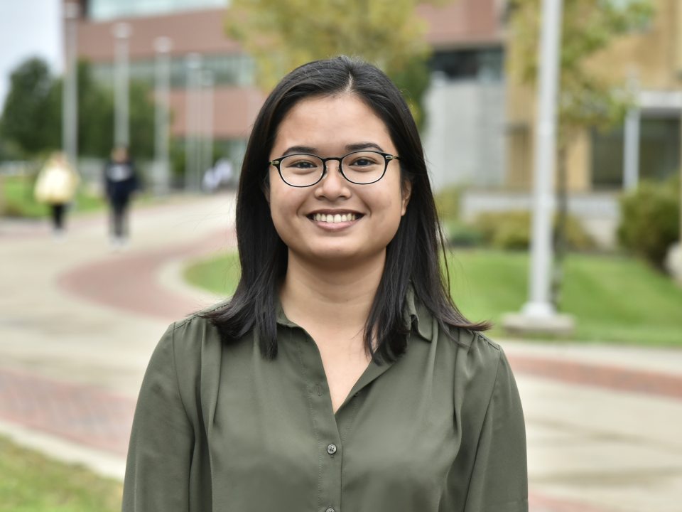 Young woman on Shineman walkway