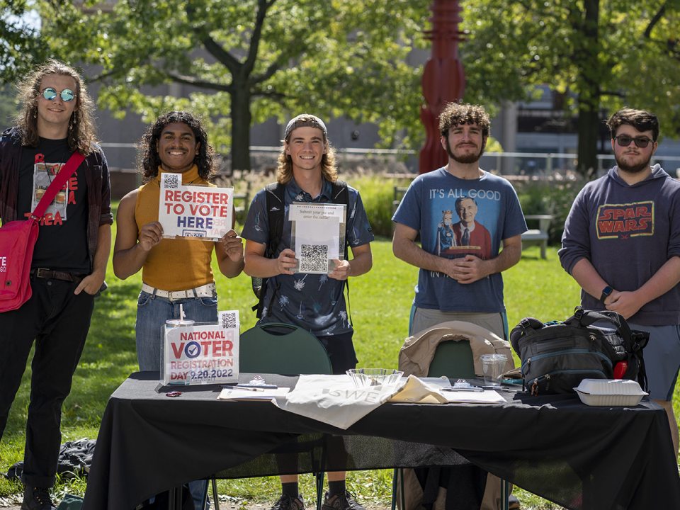 Five student advocates table for Voter Registration Day