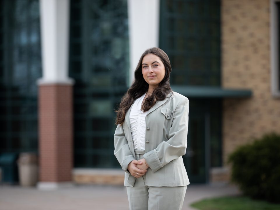 female student in a suit