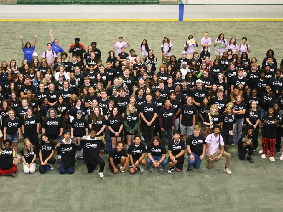 A large group of students gathered together, representing the ACE program