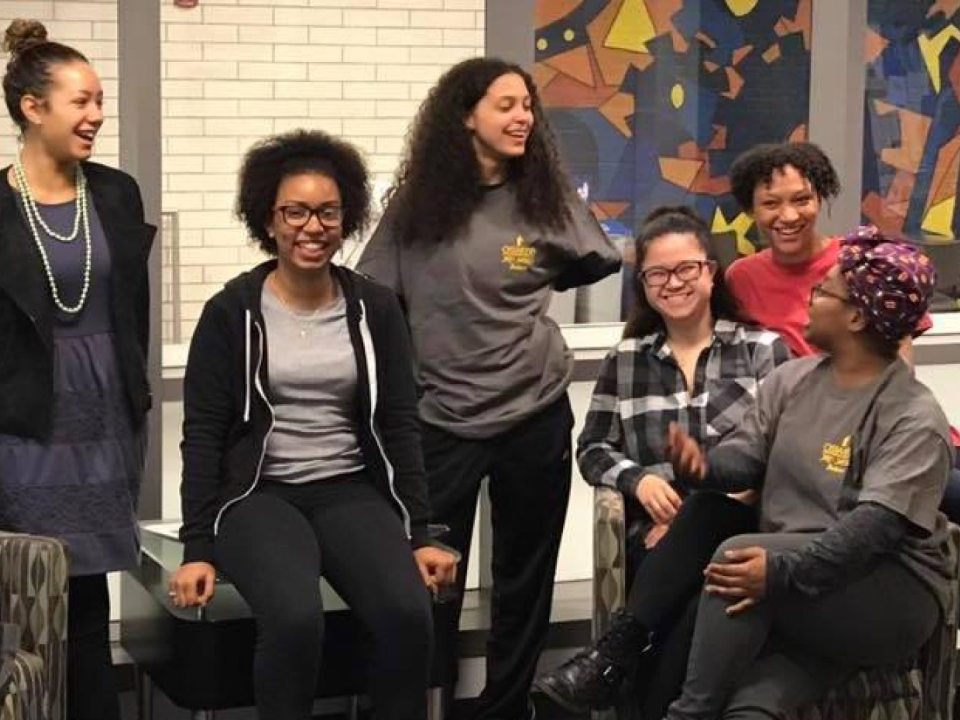 A group of students gathered in a lounge