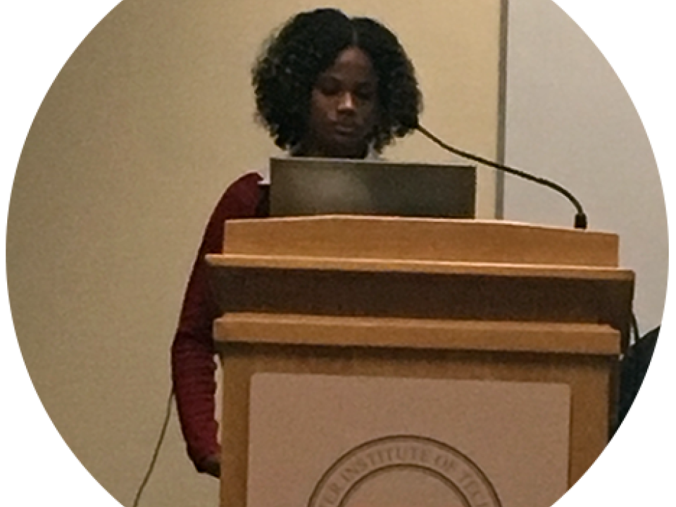 Sociology club member speaking on stage