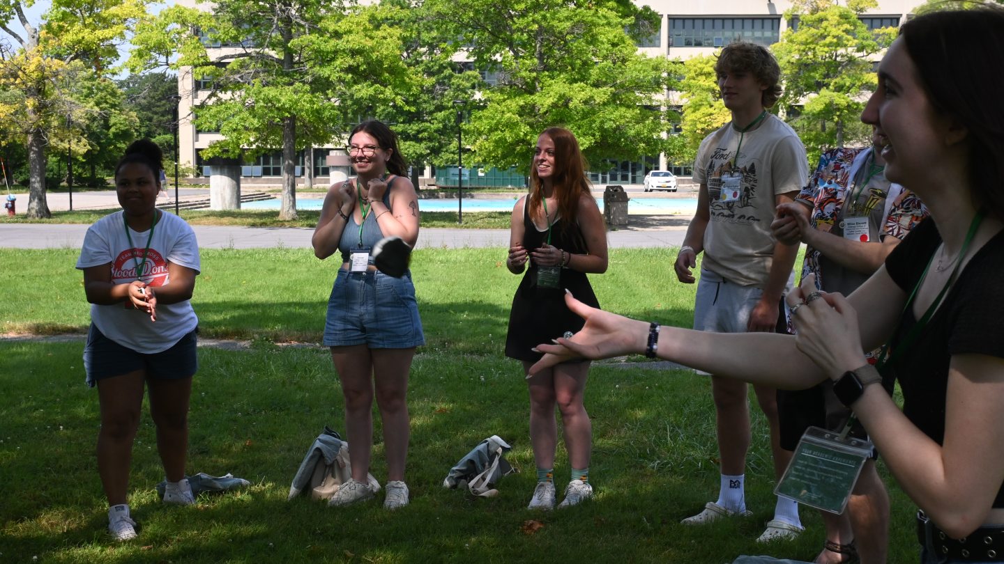 A Group of students playing a game during Orientation Small Groups