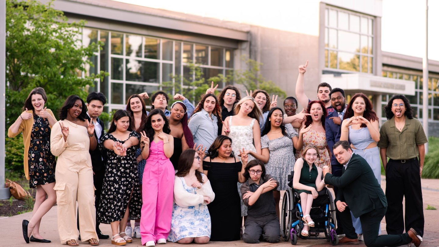 The whole SOFE Staff dressed up and making silly faces toward the camera