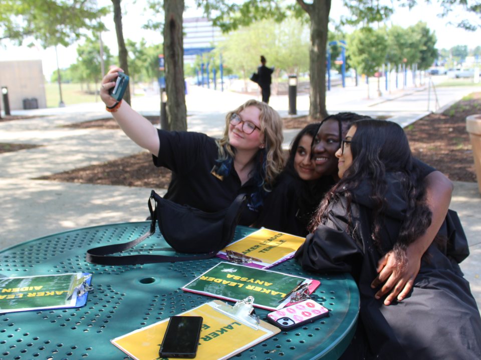 Four Laker Leaders gathered together to take a selfie