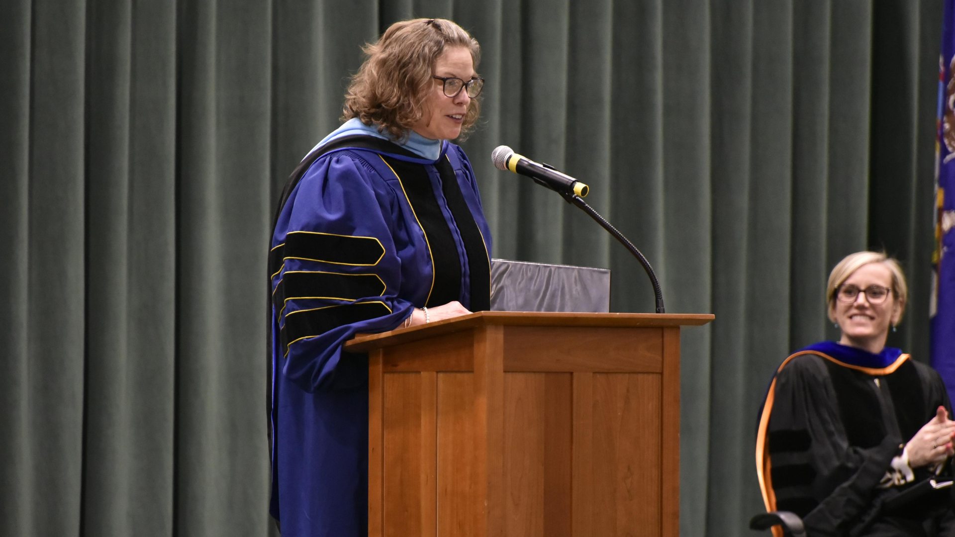 Dr. Kerr speaking at a graduation ceremony