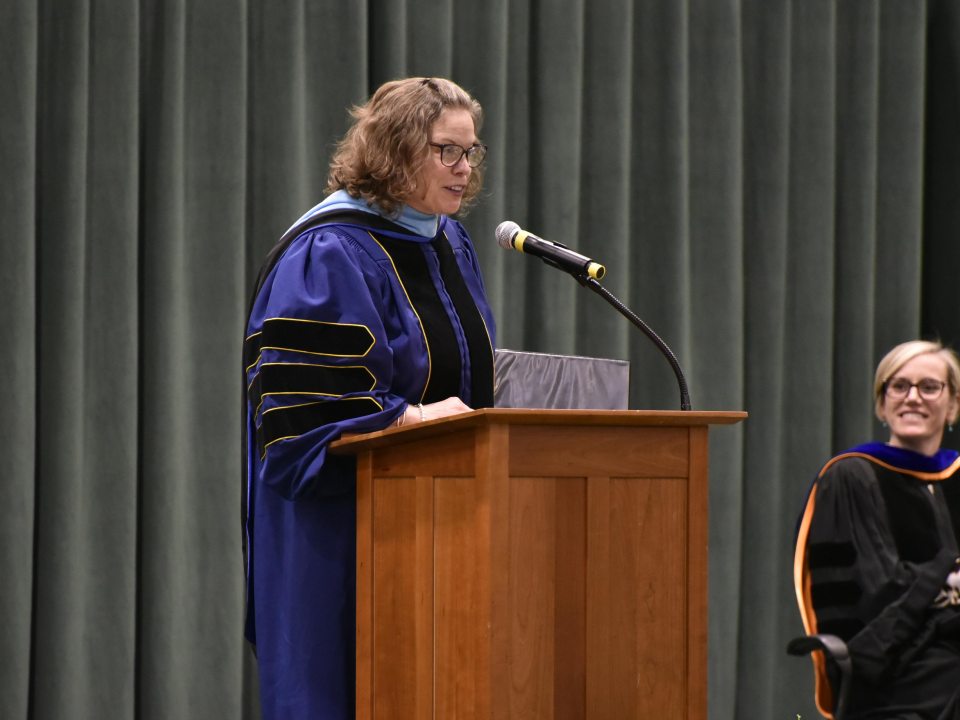 Dr. Kerr speaking at a graduation ceremony