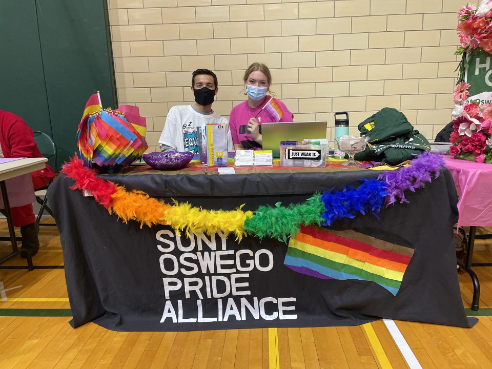 Students tabling for Oswego Pride Alliance